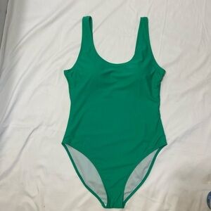 Nicole Miller Studio, Light Greene,One piece Bath Suit. Size- Large.New With Tag